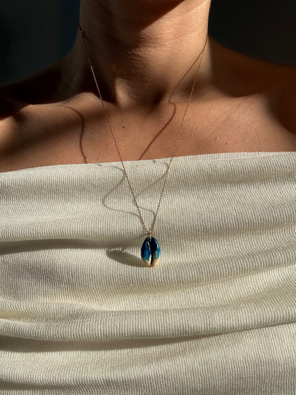 BLUE SHELL NECKLACE